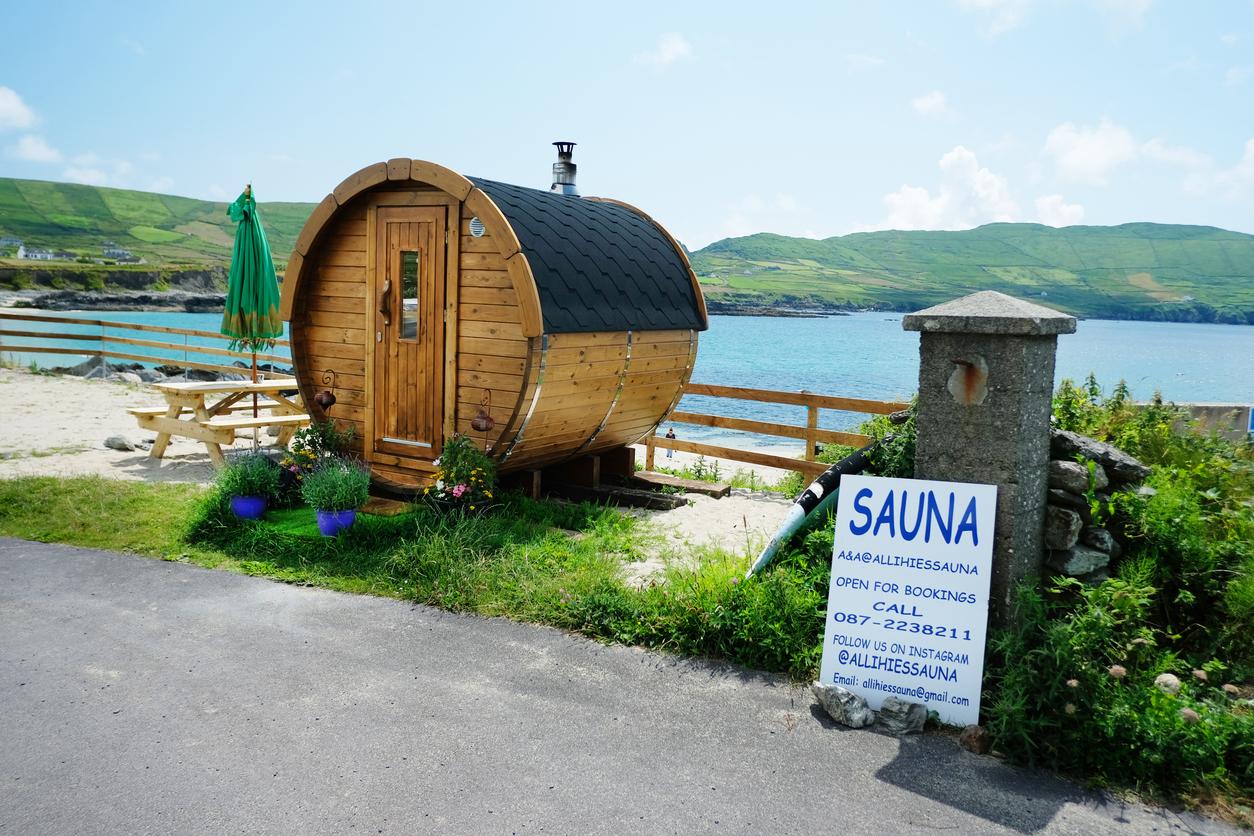 Photo of small wooden sauna by sea in Ireland