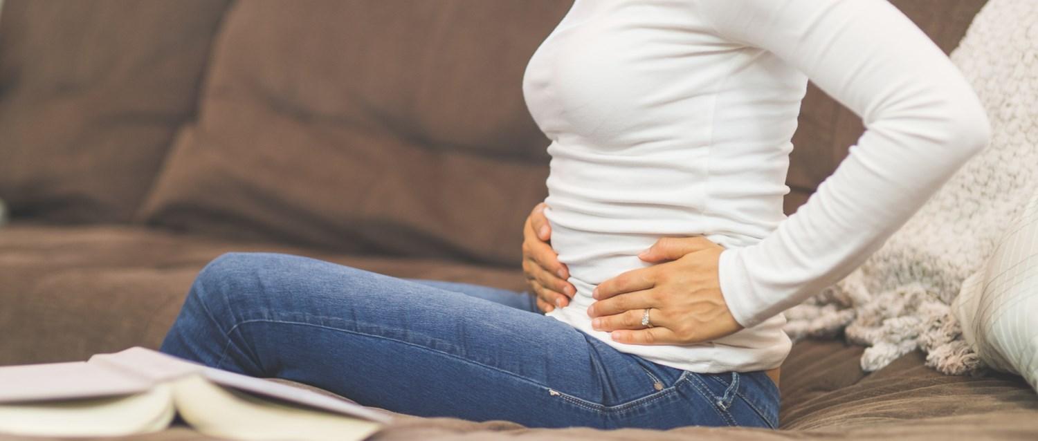 Woman suffering from pelvic pain